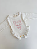 SHE'S HERE BOW- FRILL LEG ROMPER | MILK - 0000 NB