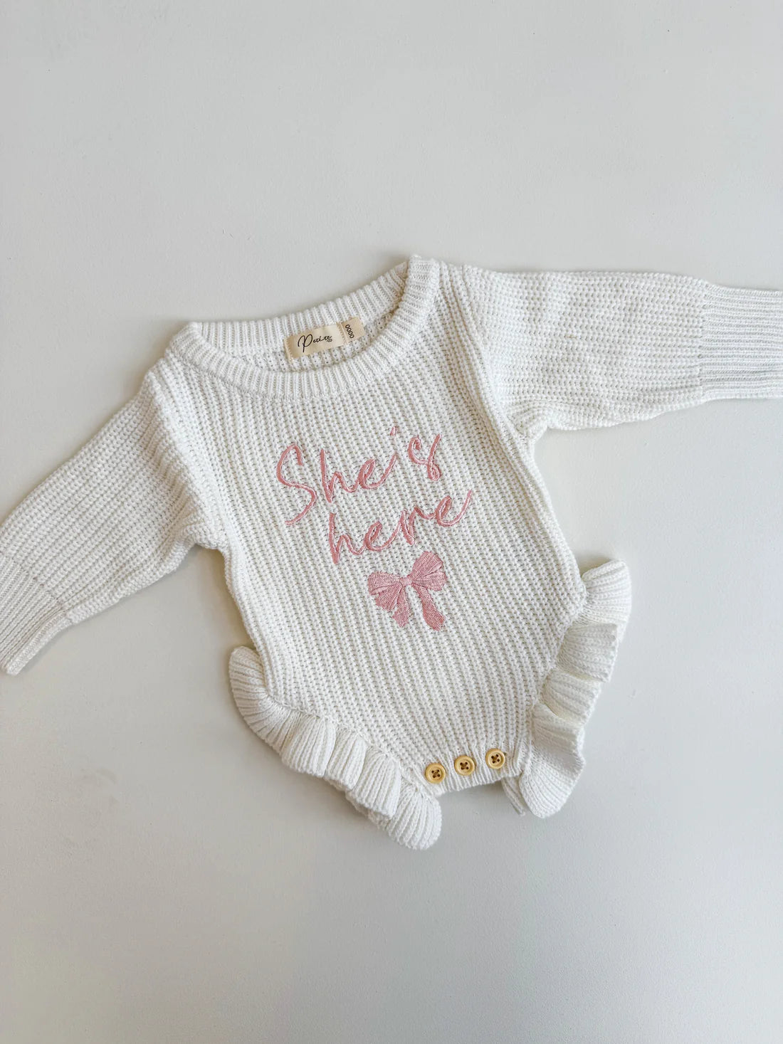 SHE'S HERE BOW- FRILL LEG ROMPER | MILK - 0000 NB
