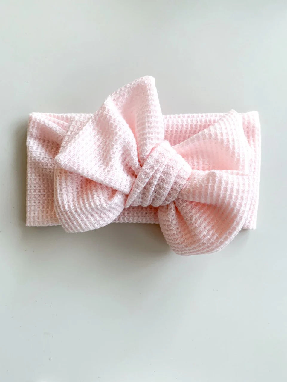 CHUNKY WAFFLE BOW HEADBAND - BABY PINK